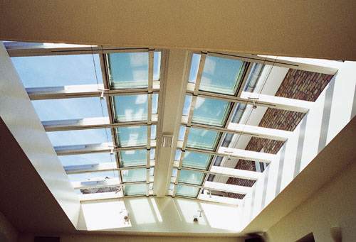 Topsen acetic silicone sealant 7132 applied in a glass sunroom setting.