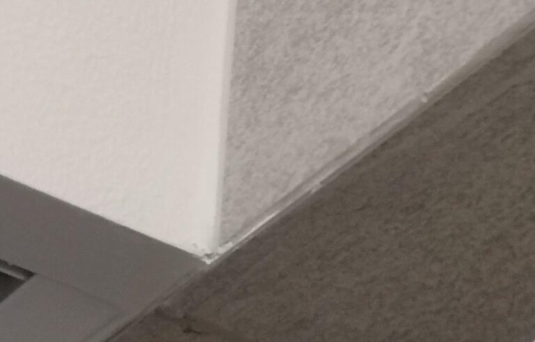 Topsen acrylic sealant 155 applied to fill gaps in a plaster wall joint.