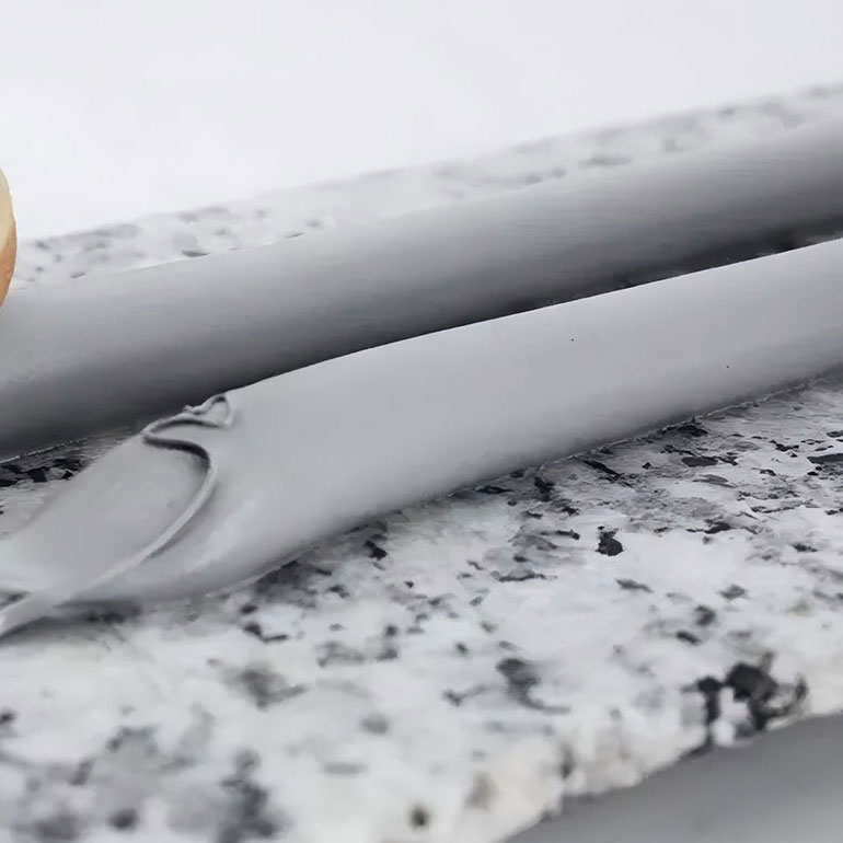 Gray Topsen PU Sealant PU-540 applied for sealing and bonding in construction