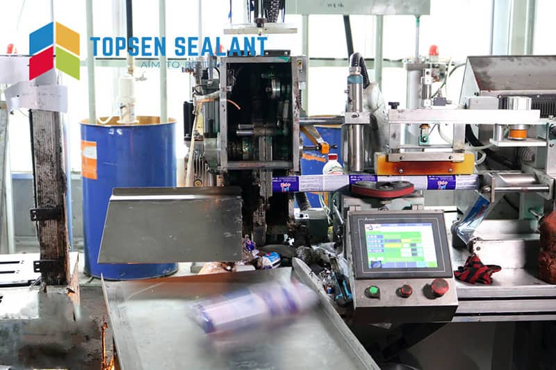Sausage packaging production at Topsen Sealant factory, showcasing efficient sealant filling